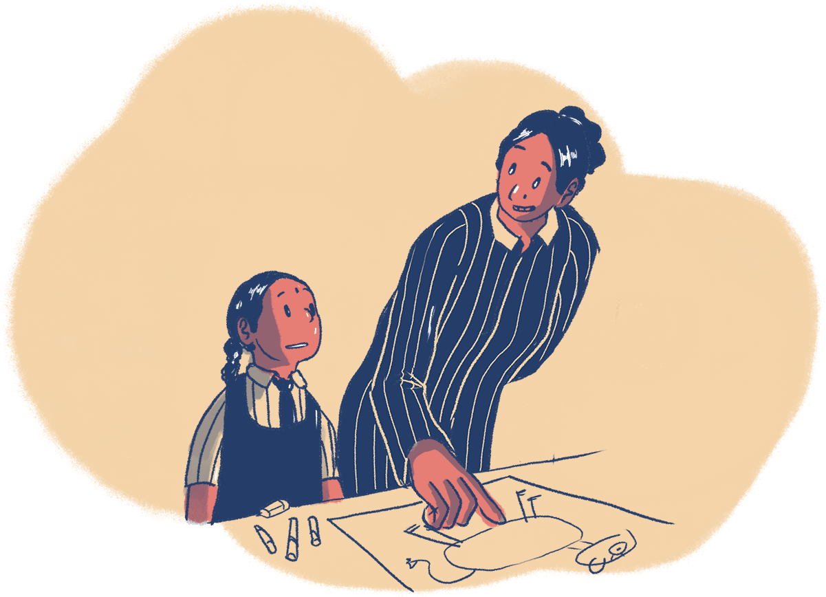 A young child, in a school uniform, is smiling and looking up at her teacher. They are standing in front of a table with a drawing the girl has made, and there are three crayons on the table.